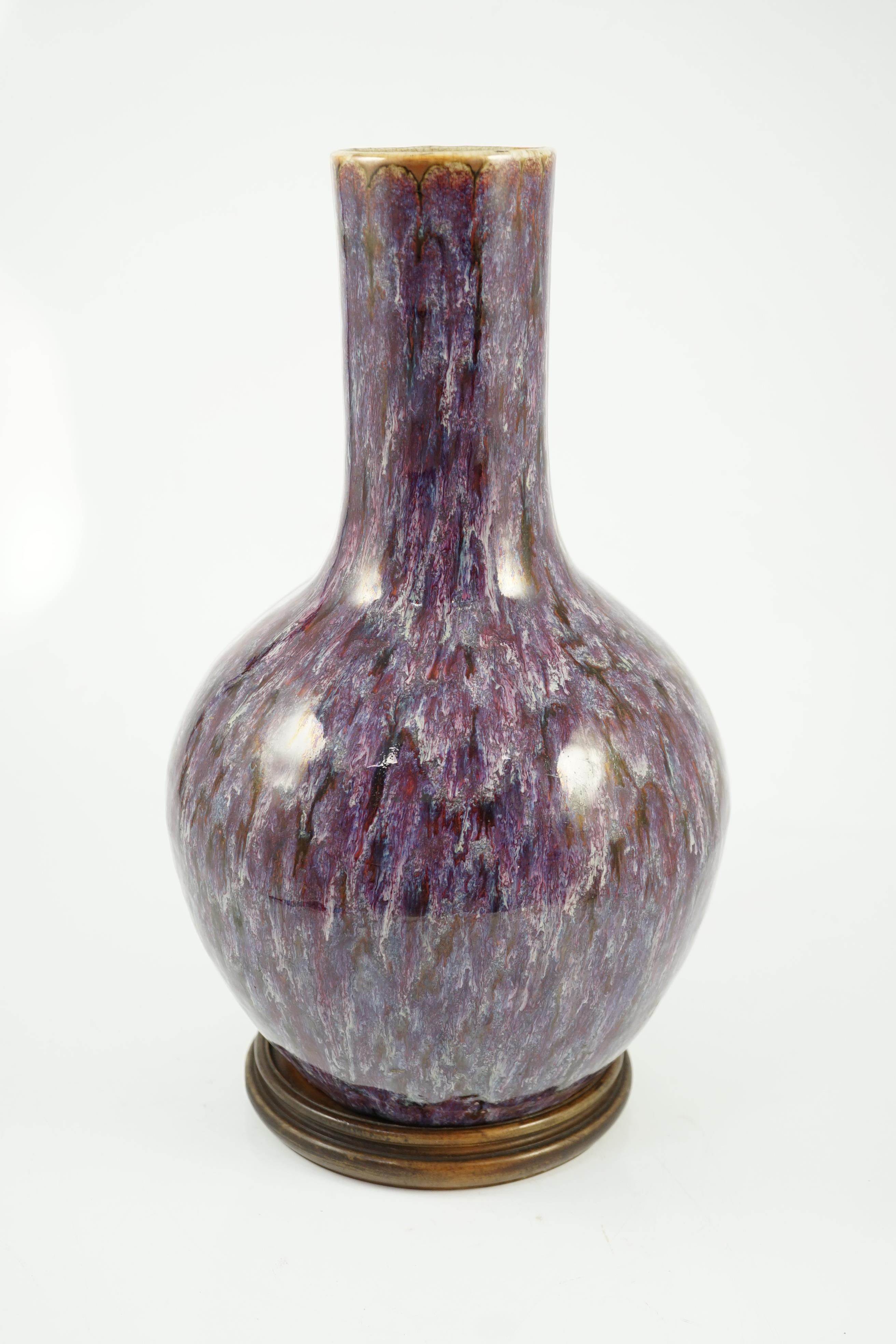 A large Chinese flambé-glazed bottle vase, tianqiuping, 18th/19th century, star crack to base